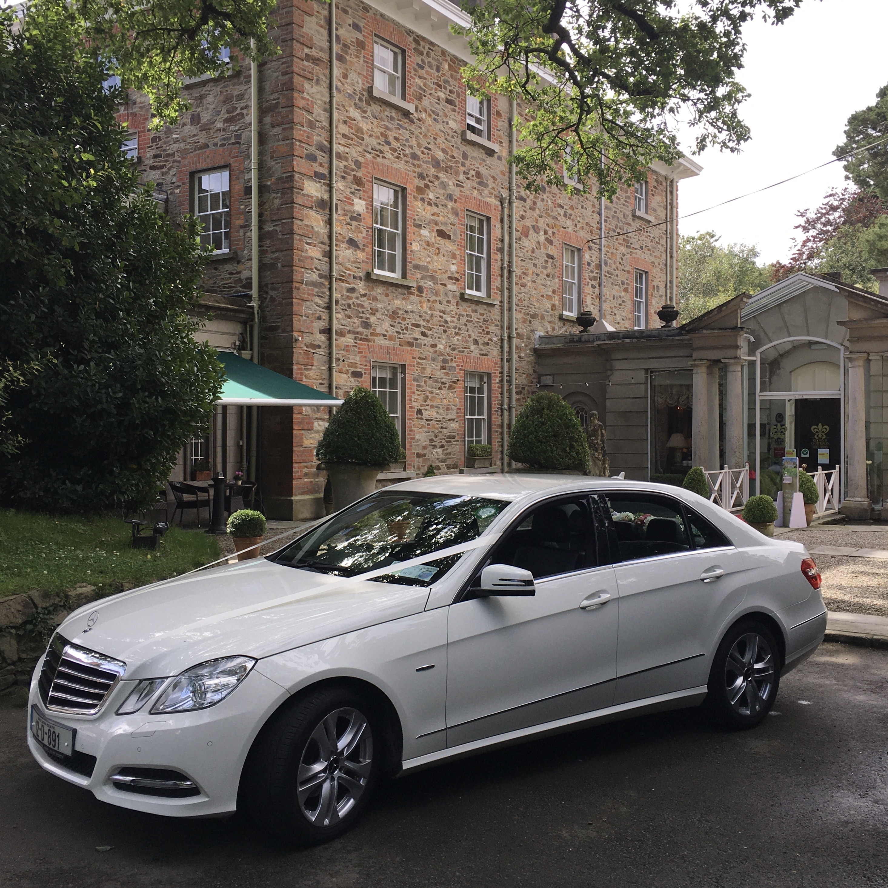 Wedding Day at Marlfield House Gorey with our white Mercedes 