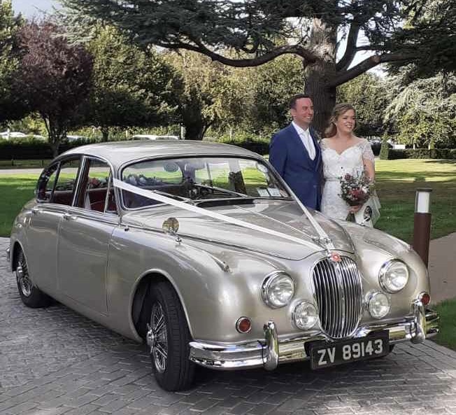 why not hire our beautiful Gold Jaguar wedding car
